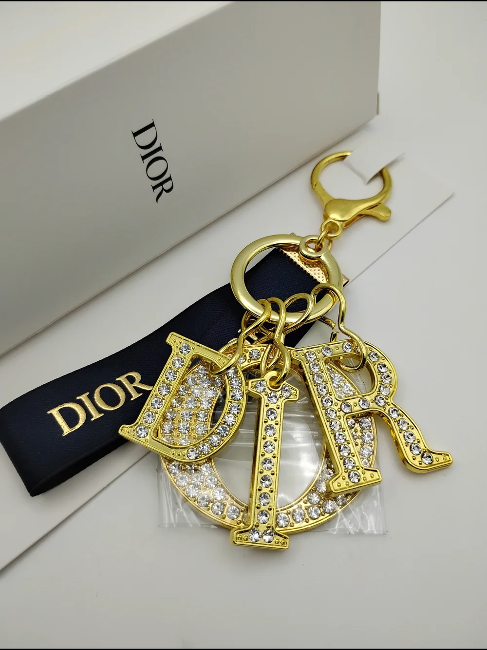 Dior Gold Crystal 'D I O R' Logo Keychain with Black Ribbon BNIB